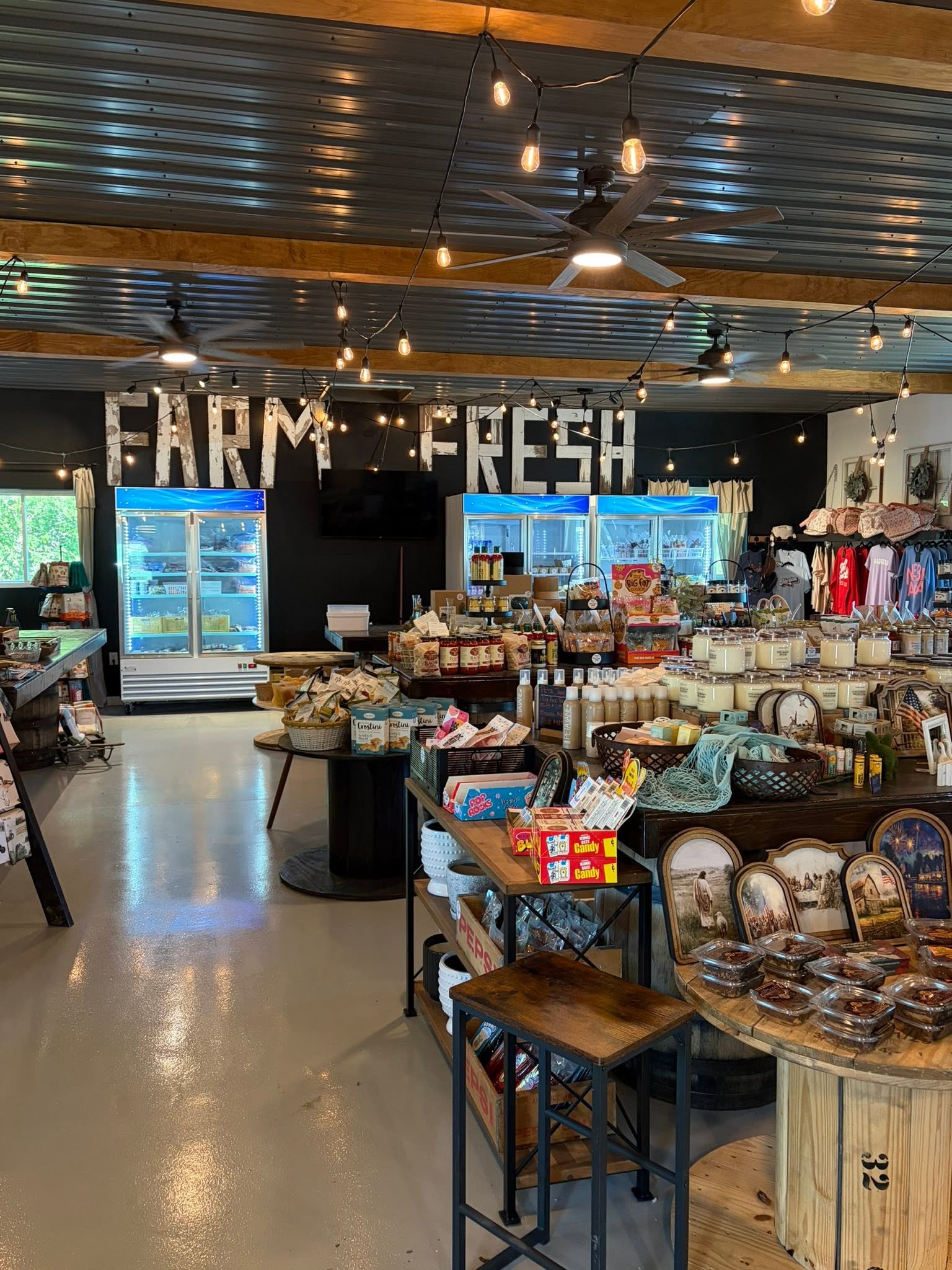 Interior of the Bennington Farms market with the Farm Fresh sign and full shelves